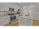 Kitchen with stainless steel appliances and white cabinets at 161 Saddle St, Conway, SC 29527