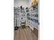 Walk-in pantry with ample shelving for storage at 161 Saddle St, Conway, SC 29527