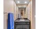 Bathroom vanity with granite counters and mirror at 1900 Duffy St. # C-7, North Myrtle Beach, SC 29582