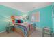 Cozy bedroom featuring bright, colorful decor and comfortable furnishings at 1900 Duffy St. # C-7, North Myrtle Beach, SC 29582