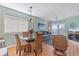 A living room that has plenty of space with a ceiling fan at 1900 Duffy St. # C-7, North Myrtle Beach, SC 29582