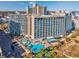 Aerial view of resort with pool, seating area and beach access at 201 74Th Ave. N # 2640, Myrtle Beach, SC 29572