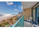 Relaxing balcony view overlooking the beach, ocean, and pool area at 201 74Th Ave. N # 2640, Myrtle Beach, SC 29572