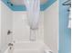 Clean and functional bathroom features a shower-tub combination with a white shower curtain at 201 74Th Ave. N # 2640, Myrtle Beach, SC 29572