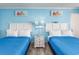 Bright bedroom with ocean decor, two queen beds and ocean view at 201 74Th Ave. N # 2640, Myrtle Beach, SC 29572