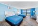 Bright bedroom with ocean view, two queen beds, a sofa and balcony at 201 74Th Ave. N # 2640, Myrtle Beach, SC 29572