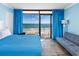 View of the bedroom with queen bed, sofa and balcony overlooking the ocean at 201 74Th Ave. N # 2640, Myrtle Beach, SC 29572