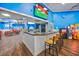 Casual dining area featuring a bar and arcade games in the background at 201 74Th Ave. N # 2640, Myrtle Beach, SC 29572