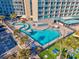 Resort pool area with a lazy river, lounge chairs, and golf cart parking at 201 74Th Ave. N # 2640, Myrtle Beach, SC 29572