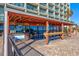 A beachfront Tiki bar with comfortable seating and stylish decorations at 201 74Th Ave. N # 2640, Myrtle Beach, SC 29572