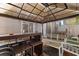 Covered patio with wicker furniture and bar at 214 13Th Ave. S # C, Surfside Beach, SC 29575