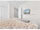King-size bed and mounted TV in a second bedroom at 214 13Th Ave. S # C, Surfside Beach, SC 29575