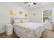King-size bed in a bright bedroom with coastal decor at 214 13Th Ave. S # C, Surfside Beach, SC 29575