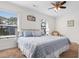 King-size bed in a bedroom with blue and white bedding at 214 13Th Ave. S # C, Surfside Beach, SC 29575
