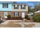 Attractive two-story townhouse with a golf cart at 214 13Th Ave. S # C, Surfside Beach, SC 29575