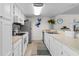 Bright kitchen featuring white cabinets and a pelican decal at 214 13Th Ave. S # C, Surfside Beach, SC 29575