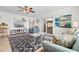 Living area with comfy seating and a large flat screen TV at 214 13Th Ave. S # C, Surfside Beach, SC 29575