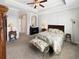 Spacious Primary bedroom with carpeted floors and ensuite bathroom at 220 Machrie Loop # A, Myrtle Beach, SC 29588