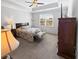 Bright bedroom with carpeted floors and ceiling fan at 220 Machrie Loop # A, Myrtle Beach, SC 29588