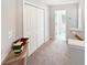 Upstairs hallway with linen closet and bathroom access at 220 Machrie Loop # A, Myrtle Beach, SC 29588