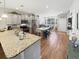 L-shaped kitchen with granite countertops and stainless steel appliances at 220 Machrie Loop # A, Myrtle Beach, SC 29588