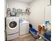 Laundry room with washer, dryer, and shelving at 220 Machrie Loop # A, Myrtle Beach, SC 29588