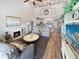 Open concept living room with hardwood floors and a view of the kitchen at 220 Machrie Loop # A, Myrtle Beach, SC 29588