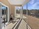 Private screened porch with comfortable seating and backyard view at 220 Machrie Loop # A, Myrtle Beach, SC 29588