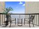 Oceanfront balcony with chairs and table at 2311 South Ocean Blvd. # 1164, Myrtle Beach, SC 29577