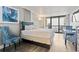 King-size bed, ocean view, balcony access, and comfortable seating at 2311 South Ocean Blvd. # 1164, Myrtle Beach, SC 29577