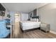 King bed, dresser, and view of kitchen at 2311 South Ocean Blvd. # 1164, Myrtle Beach, SC 29577