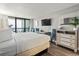 King-size bed, dresser, work area, and ocean view at 2311 South Ocean Blvd. # 1164, Myrtle Beach, SC 29577