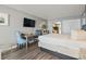 King bed, work area, and view of kitchen at 2311 South Ocean Blvd. # 1164, Myrtle Beach, SC 29577