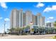 Oceanfront resort building, multiple stories, with parking and landscaping at 2311 South Ocean Blvd. # 1164, Myrtle Beach, SC 29577