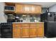 Kitchen with granite countertops and wood cabinets at 2311 South Ocean Blvd. # 1164, Myrtle Beach, SC 29577