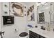 Contemporary bathroom with dark vanity and stylish art at 324 Golan Circle # B, Myrtle Beach, SC 29579