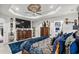 Bright bedroom featuring a large TV and ornate dresser at 324 Golan Circle # B, Myrtle Beach, SC 29579