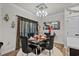 Formal dining area with a modern table and black velvet chairs at 324 Golan Circle # B, Myrtle Beach, SC 29579