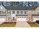 Three-unit townhome development showcasing attractive exteriors and landscaping at 324 Golan Circle # B, Myrtle Beach, SC 29579