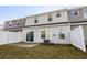 Townhouse exterior with white vinyl siding and small backyard at 324 Golan Circle # B, Myrtle Beach, SC 29579