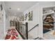 Upstairs hallway with decorative wall art and carpet at 324 Golan Circle # B, Myrtle Beach, SC 29579
