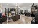 Open living room with a fireplace, plush seating and large TV at 324 Golan Circle # B, Myrtle Beach, SC 29579