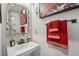 Stylish powder room featuring a modern sink and red towels at 324 Golan Circle # B, Myrtle Beach, SC 29579