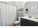 Clean bathroom with shower, toilet, and vanity at 417 San Benito Ct., Longs, SC 29568