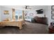 Comfortable bedroom with a bed, dresser, and TV at 417 San Benito Ct., Longs, SC 29568