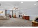 Bright bonus room featuring comfy seating and natural light at 417 San Benito Ct., Longs, SC 29568