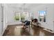 Charming dining area with hardwood floors and large windows at 417 San Benito Ct., Longs, SC 29568