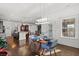 Open concept dining area with hardwood floors and kitchen views at 417 San Benito Ct., Longs, SC 29568
