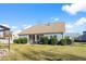 Back of house with screened porch and fenced yard at 417 San Benito Ct., Longs, SC 29568