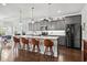 Modern kitchen boasts granite countertops and stainless steel appliances at 417 San Benito Ct., Longs, SC 29568